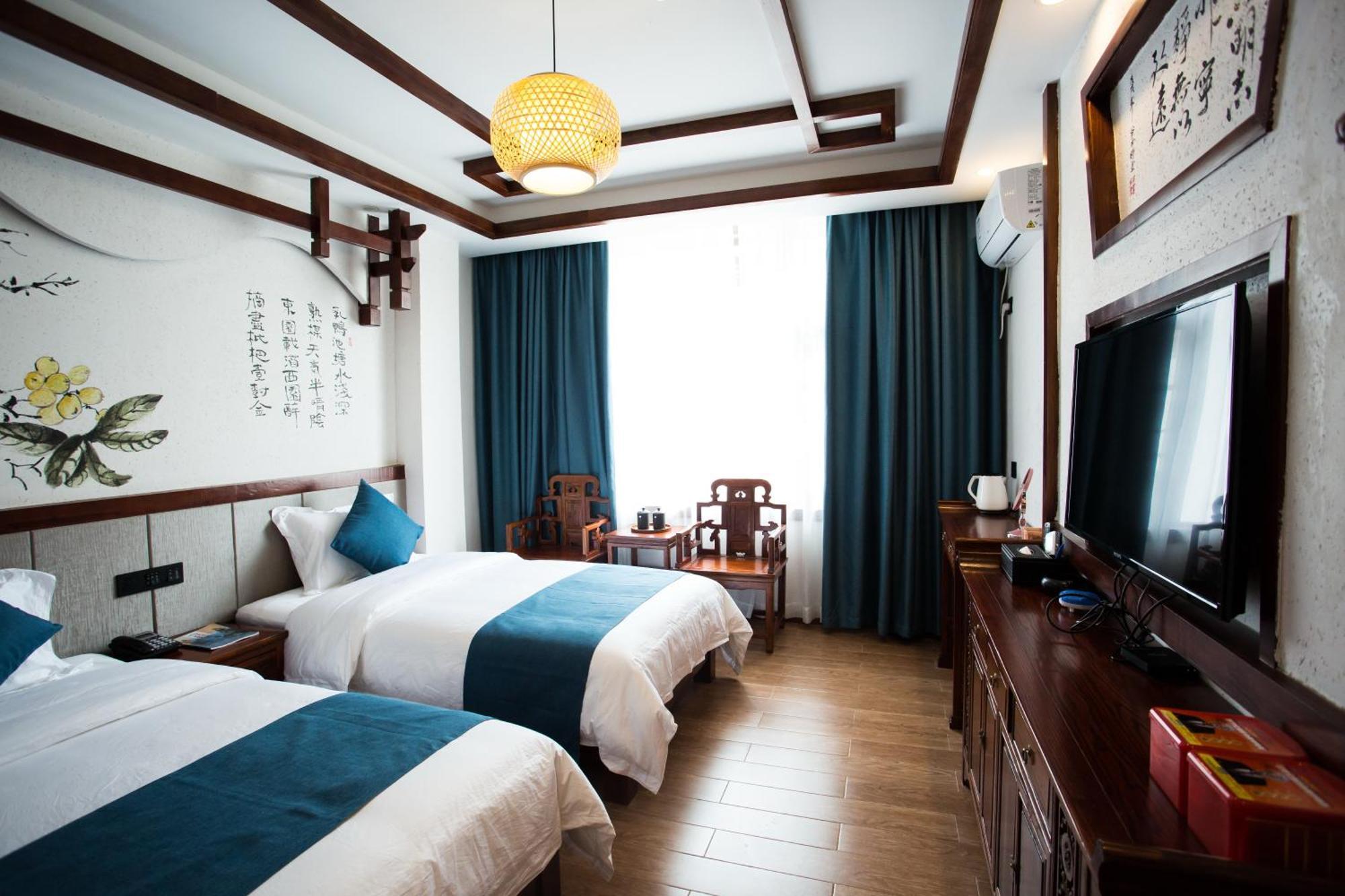一树一花客栈眷恋店 Appartement Wulingyuan Buitenkant foto